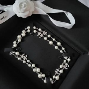 Brand New authentic Chanel 5 crystal cc pearly long necklace